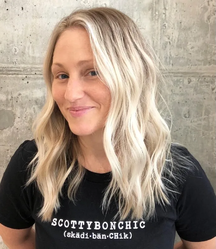 Lived-in blonde waves in the Scotty Bon tee.