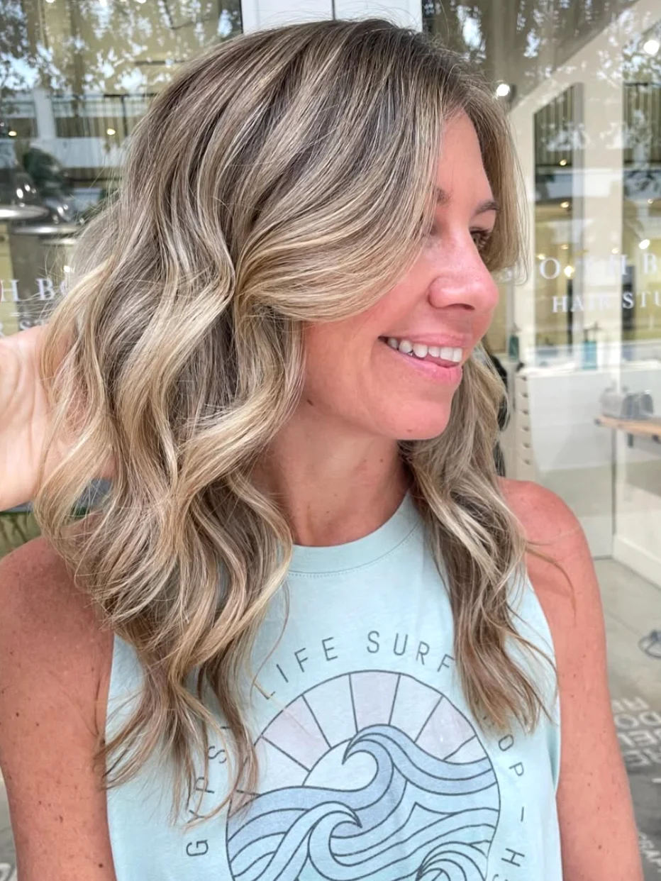 Blonde Highlights cut and beach waved